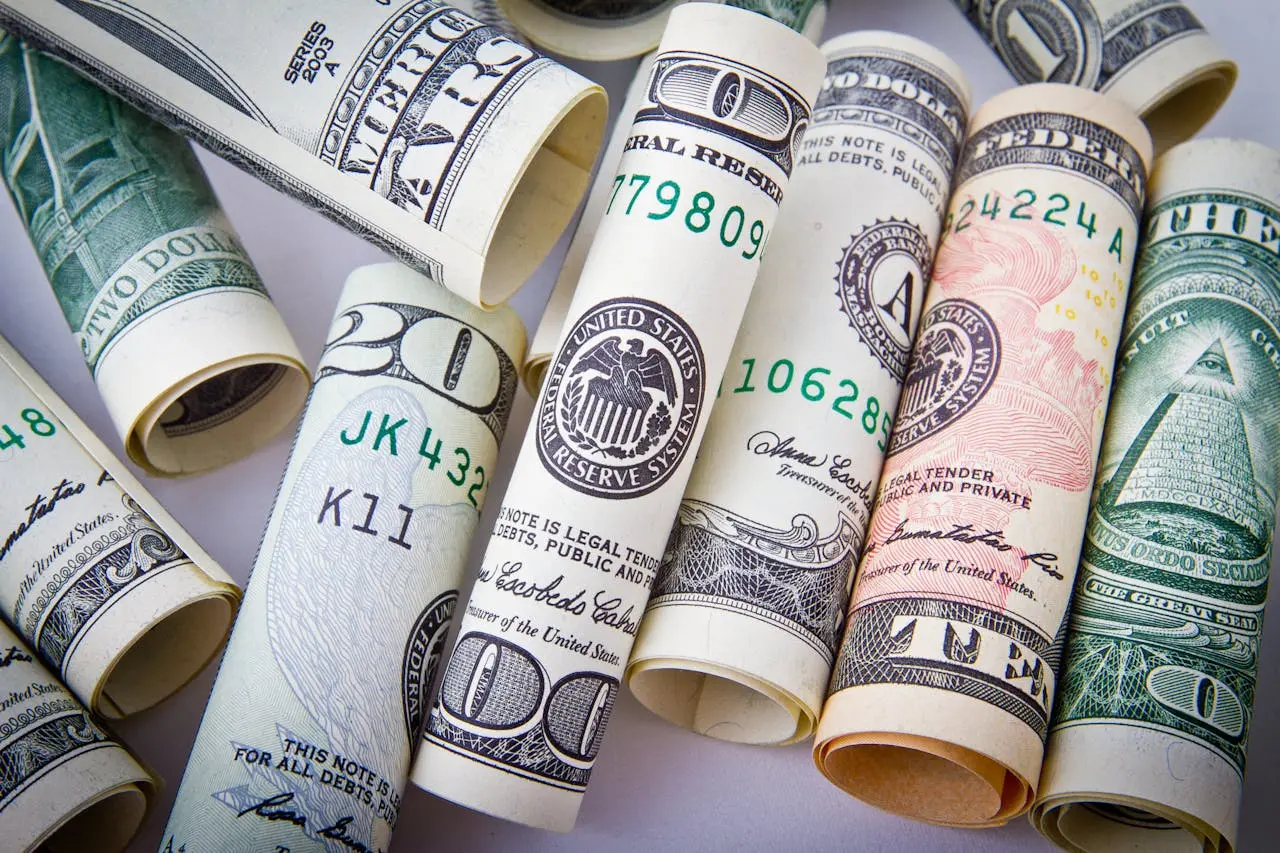 U.S. Dollar Strengthens After Mixed July Inflation; Canadian Dollar Slips on Oil and Risk Sentiment